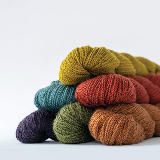 Colorful skeins of Andorra classic merino wool and mohair sport weight yarn